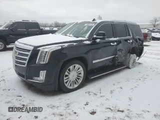 2017 Cadillac Escalade Platinum z VIN 1GYS4DKJ9HR207272, wystawiony jako Copart lot #44024135 z przebiegiem 92 820 mil mil oraz Czysty tytuł • Clean title. Historia ofert i sprzedaży dostępna na DreamBid. Obrazek 1.