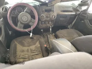 2013 Jeep Wrangler Unlimited Sport z VIN 1C4BJWDG8DL513680, wystawiony jako Copart lot #53805485 z przebiegiem 135 676 mil mil oraz Szkoda całkowita • Salvage title. Historia ofert i sprzedaży dostępna na DreamBid. Obrazek 8.