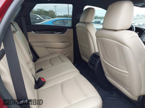 2017 Cadillac XT5 FWD with VIN 1GYKNARS2HZ107587, listed as a IAAI auction lot 41614842 with 124,611 mi miles and . Bid and sale history available at carsss.com. Image 8.