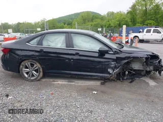 2023 Volkswagen Jetta SE z VIN 3VW7M7BUXPM061694, wystawiony jako IAAI lot #42231342 z przebiegiem 39 063 mil mil oraz . Historia ofert i sprzedaży dostępna na DreamBid. Obrazek 13.