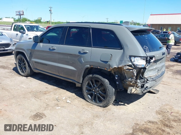 2019 Jeep Grand Cherokee Laredo E with VIN 1C4RJFAG8KC849782, listed as a IAAI auction lot 42151331 with 141,099 mi miles and . Bid and sale history available at DreamBid. Image 3.