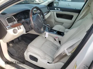 2012 Lincoln MKS z VIN 1LNHL9ER0CG803078, wystawiony jako Copart lot #60514765 z przebiegiem 82 715 mil mil oraz Szkoda całkowita • Salvage title. Historia ofert i sprzedaży dostępna na DreamBid. Obrazek 7.
