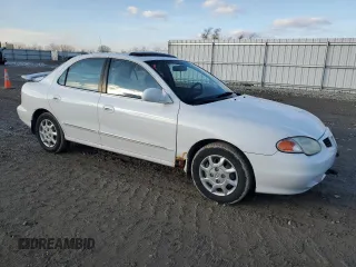 2000 Hyundai Elantra GLS z VIN KMHJF35F4YU038977, wystawiony jako Copart lot #80800144 z przebiegiem 97 373 mil mil oraz Czysty tytuł • Clean title. Historia ofert i sprzedaży dostępna na DreamBid. Obrazek 4.