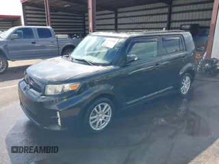 2014 Scion xB with VIN JTLZE4FE4EJ064549, listed as a IAAI auction lot 41392280 with 148,962 mi miles. Bid and sale history available at carsss.com. Image 2.