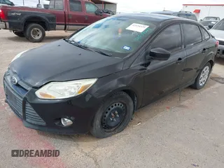 2012 Ford Focus SE with VIN 1FAHP3F23CL449397, listed as a IAAI auction lot 42534329 with 165,593 mi miles and . Bid and sale history available at DreamBid. Image 2.
