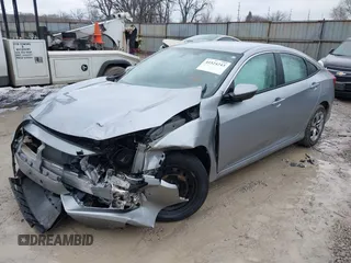 2017 Honda Civic LX z VIN 2HGFC2F51HH562496, wystawiony jako IAAI lot #41524243 z przebiegiem Nie podano mil oraz . Historia ofert i sprzedaży dostępna na DreamBid. Obrazek 2.
