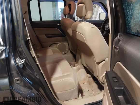 2014 Jeep Patriot Latitude with VIN 1C4NJPFA0ED633657, listed as a IAAI auction lot 41447982 with 104,664 mi miles and . Bid and sale history available at carsss.com. Image 8.