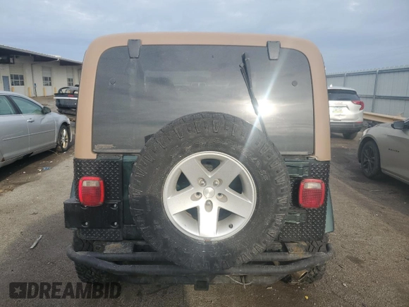2001 Jeep Wrangler Sahara with VIN 1J4FA59S51P324010, listed as a Copart auction lot 43264515 with 163,056 mi miles and Salvage Title. Bid and sale history available at carsss.com. Image 6.