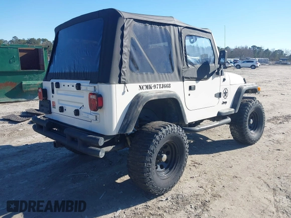 1997 Jeep Wrangler Sport with VIN 1J4FY19S7VP483735, listed as a IAAI auction lot 41469983 with 150,542 mi miles. Bid and sale history available at carsss.com. Image 4.
