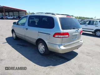 2001 Toyota Sienna LE with VIN 4T3ZF13CX1U372072, listed as a IAAI auction lot 41889291 with 228,959 mi miles. Bid and sale history available at carsss.com. Image 3.