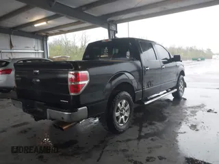 2014 Ford F-150 XL with VIN 1FTFW1CF1EKE50377, listed as a IAAI auction lot 41840173 with 221,366 mi miles. Bid and sale history available at carsss.com. Image 4.