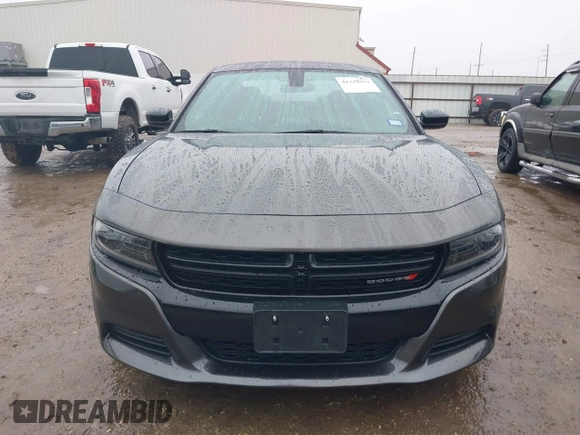 2023 Dodge Charger SXT with VIN 2C3CDXBG8PH566020, listed as a IAAI auction lot 41433879 with 22,187 mi miles and . Bid and sale history available at DreamBid. Image 6.