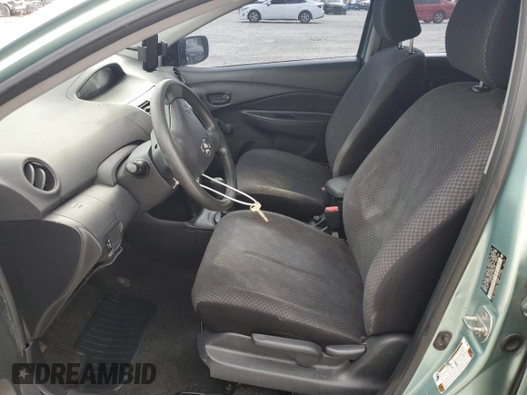 2007 Toyota Yaris with VIN JTDBT923271052472, listed as a Copart auction lot 50942975 with 147,363 mi miles and Salvage Title. Bid and sale history available at DreamBid. Image 7.