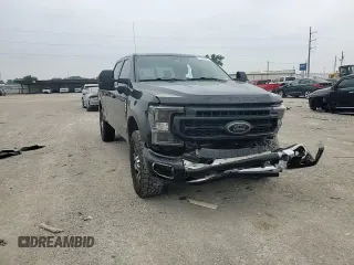 2020 Ford F-250 XL z VIN 1FT7W2BT5LEE67941, wystawiony jako Copart lot #57270215 z przebiegiem 143 669 mil mil oraz Szkoda całkowita • Salvage title. Historia ofert i sprzedaży dostępna na DreamBid. Obrazek 14.