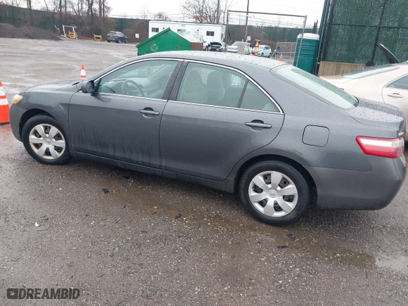 2007 Toyota Camry CE with VIN 4T1BE46K77U688152, listed as a IAAI auction lot 41799406 with 152,033 mi miles. Bid and sale history available at carsss.com. Image 3.