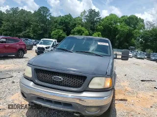 2002 Ford F-150 XL z VIN 1FTRX18L52NB59531, wystawiony jako Copart lot #58550365 z przebiegiem 267 424 mil mil oraz Szkoda całkowita • Salvage title. Historia ofert i sprzedaży dostępna na DreamBid. Obrazek 13.