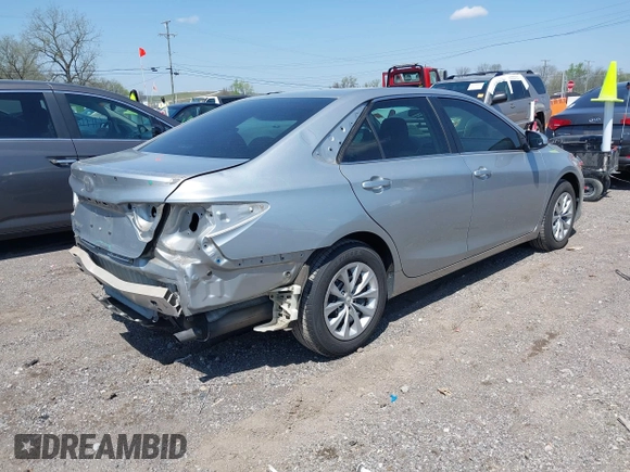 2016 Toyota Camry XLE with VIN 4T4BF1FK2GR548706, listed as a IAAI auction lot 41965363 with 70,284 mi miles and . Bid and sale history available at carsss.com. Image 4.