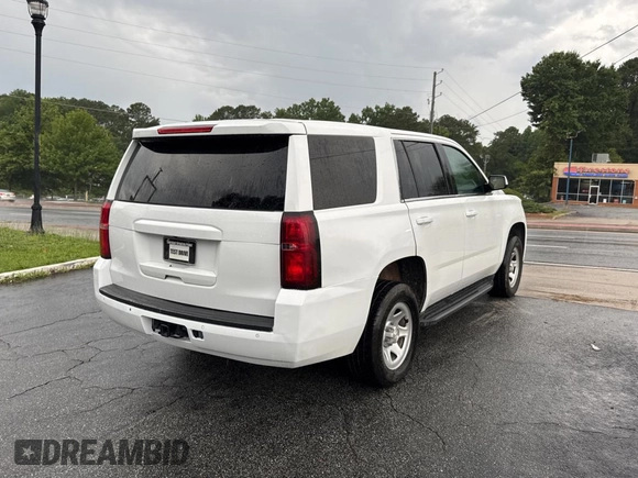 2019 Chevrolet Tahoe Commercial with VIN 1GNLCDECXKR281986, listed as a Copart auction lot 63148895 with 103,693 mi miles and Clean title. Bid and sale history available at DreamBid. Image 4.