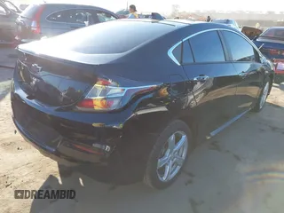2018 Chevrolet Volt LT with VIN 1G1RC6S51JU158876, listed as a IAAI auction lot 41643645 with 95,257 mi miles. Bid and sale history available at carsss.com. Image 4.