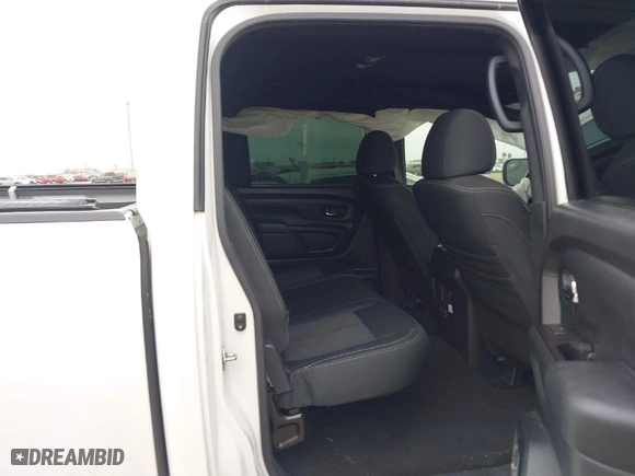 2019 Nissan Titan SV with VIN 1N6AA1E59KN530160, listed as a IAAI auction lot 41557126 with 128,594 mi miles. Bid and sale history available at carsss.com. Image 8.