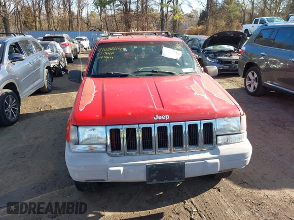 1997 Jeep Grand Cherokee Laredo with VIN 1J4GZ58S0VC550242, listed as a IAAI auction lot 41032114 with 185,307 mi miles. Bid and sale history available at carsss.com. Image 12.
