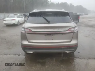 2020 Lincoln Nautilus Standard с VIN 2LMPJ6J95LBL29534, выставлен на аукционе Copart как лот 47281175 с пробегом 96 376 миль миль и Списание • Salvage title. История ставок и продаж доступна на DreamBid. Изображение 6.