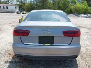2016 Audi A6 Premium z VIN WAUCFAFC2GN111968, wystawiony jako IAAI lot #42003738 z przebiegiem 149 089 mil mil oraz . Historia ofert i sprzedaży dostępna na DreamBid. Obrazek 16.