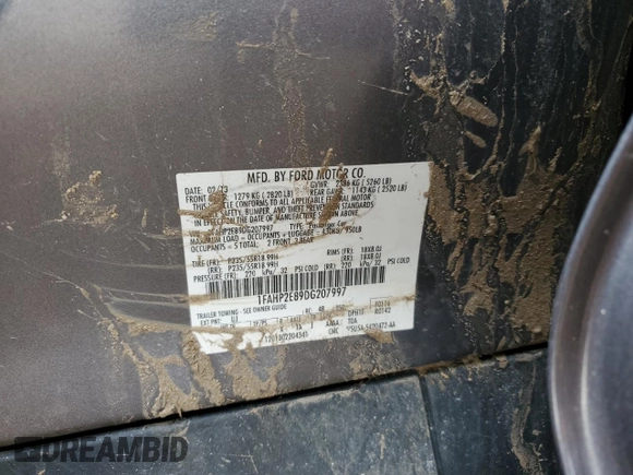 2013 Ford Taurus SEL with VIN 1FAHP2E89DG207997, listed as a Copart auction lot 51815665 with 196,904 mi miles and Clean Title. Bid and sale history available at carsss.com. Image 12.