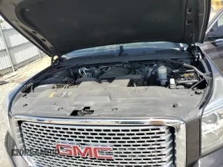 2017 GMC Yukon Denali with VIN 1GKS2CKJ3HR360319, listed as a Copart auction lot 70051014 with 127,896 mi miles and Salvage Title. Bid and sale history available at carsss.com. Image 13.