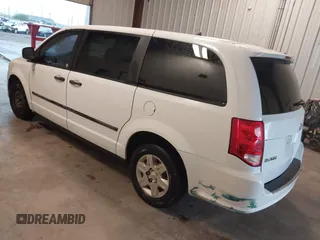 2014 Ram Cargo Van Tradesman with VIN 2C4JRGAG9ER186052, listed as a IAAI auction lot 41879655 with 239,442 mi miles. Bid and sale history available at carsss.com. Image 3.