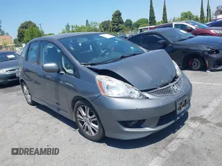 2011 Honda Fit Sport z VIN JHMGE8H53BS004855, wystawiony jako IAAI lot #42287593 z przebiegiem 119 728 mil mil oraz . Historia ofert i sprzedaży dostępna na DreamBid. Obrazek 1.