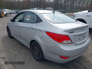 2014 Hyundai Accent GLS with VIN KMHCT4AE0EU622079, listed as a IAAI auction lot 42132818 with 132,324 mi miles. Bid and sale history available at carsss.com. Image 3.