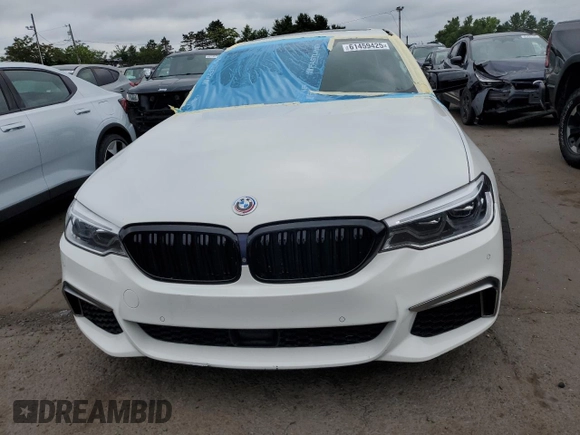 2018 BMW 5 Series M550i xDrive with VIN WBAJB9C5XJB035996, listed as a Copart auction lot 61459425 with Not provided miles and Salvage title. Bid and sale history available at DreamBid. Image 5.