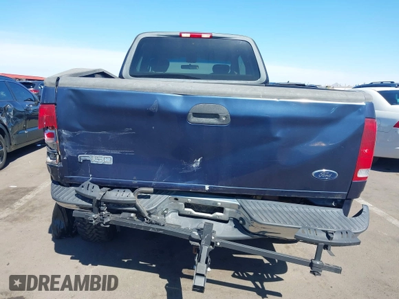 2003 Ford F-150 XL with VIN 1FTRX18WX3NA22323, listed as a IAAI auction lot 41635869 with 129,029 mi miles. Bid and sale history available at carsss.com. Image 6.