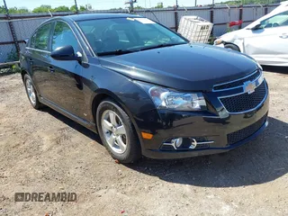 2014 Chevrolet Cruze 1LT z VIN 1G1PC5SB6E7226259, wystawiony jako IAAI lot #42280421 z przebiegiem 61 527 mil mil oraz . Historia ofert i sprzedaży dostępna na DreamBid. Obrazek 1.