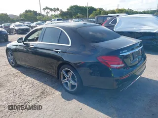 2018 Mercedes-Benz E 300 with VIN WDDZF4JB5JA380872, listed as a IAAI auction lot 42048785 with 94,574 mi miles and . Bid and sale history available at DreamBid. Image 3.