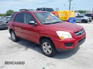 2009 Kia Sportage LX with VIN KNDJE723897599966, listed as a IAAI auction lot 42107627 with 118,512 mi miles. Bid and sale history available at carsss.com. Image 1.