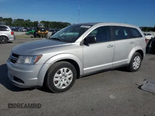 2013 Dodge Journey SE z VIN 3C4PDCAB8DT701088, wystawiony jako Copart lot #54885445 z przebiegiem 163 766 mil mil oraz Szkoda całkowita • Salvage title. Historia ofert i sprzedaży dostępna na DreamBid. Obrazek 1.