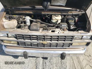 1995 Chevrolet Chevy Van z VIN 1GBEG25K9SF175004, wystawiony jako Copart lot #77952694 z przebiegiem 217 649 mil mil oraz Szkoda całkowita • Salvage title. Historia ofert i sprzedaży dostępna na DreamBid. Obrazek 12.