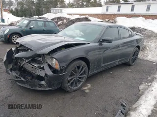 2014 Dodge Charger SXT Plus with VIN 2C3CDXJG2EH163049, listed as a IAAI auction lot 41634369 with 1 mi miles. Bid and sale history available at carsss.com. Image 2.