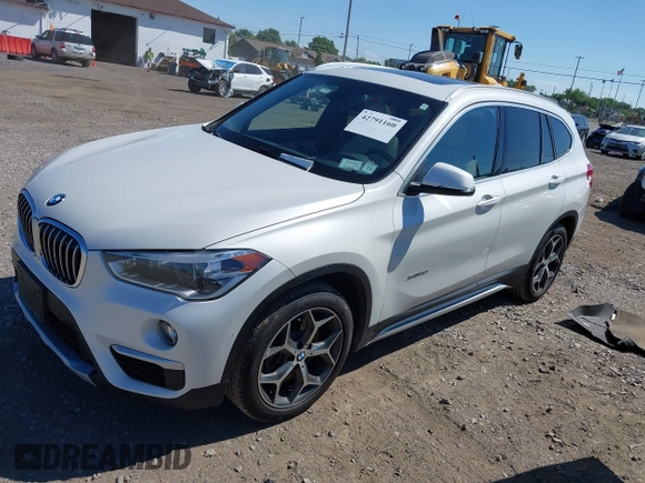 2017 BMW X1 xDrive28i z VIN WBXHT3C32H5F83287, wystawiony jako IAAI lot #42791160 z przebiegiem 69 006 mil mil oraz . Historia ofert i sprzedaży dostępna na DreamBid. Obrazek 17.