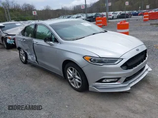 2017 Ford Fusion Titanium z VIN 3FA6P0SU0HR409820, wystawiony jako IAAI lot #41919527 z przebiegiem 77 301 mil mil oraz . Historia ofert i sprzedaży dostępna na DreamBid. Obrazek 1.