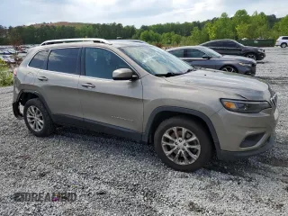 2019 Jeep Cherokee Latitude z VIN 1C4PJLCX5KD148002, wystawiony jako Copart lot #54170595 z przebiegiem 136 852 mil mil oraz Szkoda całkowita • Salvage title. Historia ofert i sprzedaży dostępna na DreamBid. Obrazek 4.