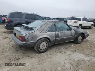 1986 Ford Mustang with VIN 1FABP28T8GF109009, listed as a Copart auction lot 83148544 with 329,005 mi miles and Salvage title. Bid and sale history available at DreamBid. Image 3.
