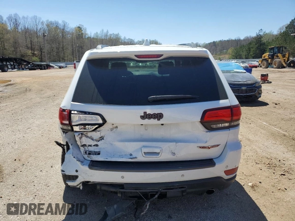 2018 Jeep Grand Cherokee Trailhawk with VIN 1C4RJFLG9JC274619, listed as a Copart auction lot 50354745 with 104,581 mi miles and Salvage title. Bid and sale history available at DreamBid. Image 6.