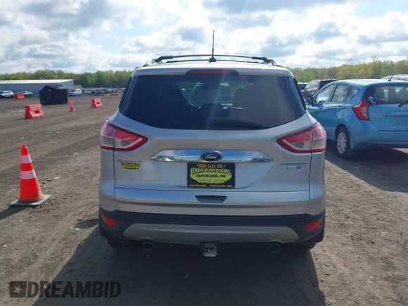 2015 Ford Escape Titanium z VIN 1FMCU9J99FUC75852, wystawiony jako IAAI lot #42171467 z przebiegiem 113 322 mil mil oraz . Historia ofert i sprzedaży dostępna na DreamBid. Obrazek 16.