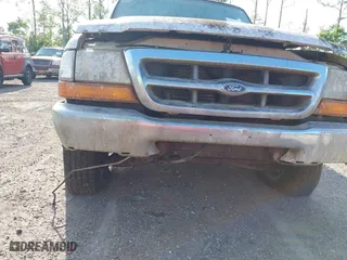 1999 Ford Ranger XL with VIN 1FTYR14V5XPA95547, listed as a IAAI auction lot 41928536 with 119,637 mi miles. Bid and sale history available at carsss.com. Image 6.