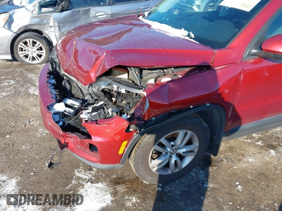 2013 Volkswagen Tiguan S with VIN WVGAV3AX1DW098392, listed as a IAAI auction lot 41420676 with 75,279 mi miles and . Bid and sale history available at DreamBid. Image 6.