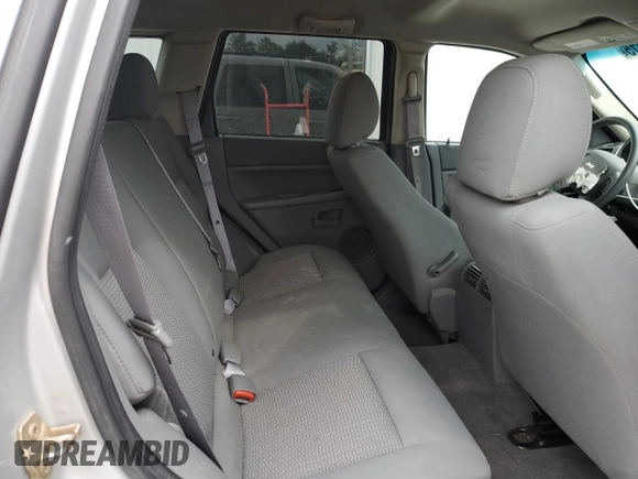 2007 Jeep Grand Cherokee Laredo z VIN 1J8GR48K37C617623, wystawiony jako Copart lot #55875115 z przebiegiem 117 588 mil mil oraz Szkoda całkowita • Salvage title. Historia ofert i sprzedaży dostępna na DreamBid. Obrazek 10.
