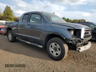 2010 Toyota Tundra 4WD Truck with VIN 5TFUY5F14AX145459, listed as a Copart auction lot 74345954 with 209,054 mi miles and Salvage Title. Bid and sale history available at carsss.com. Image 4.